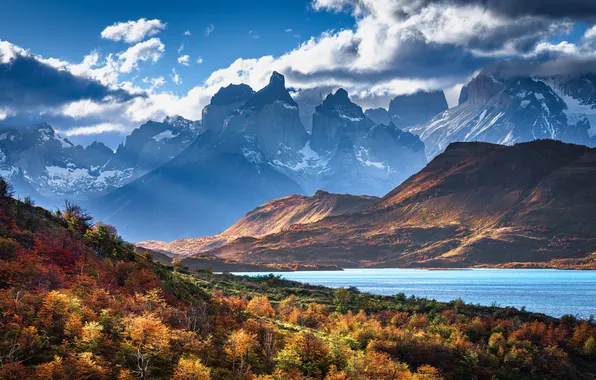 The sun, clouds, mountains, lake, rocks, Chile, Patagonia, South America