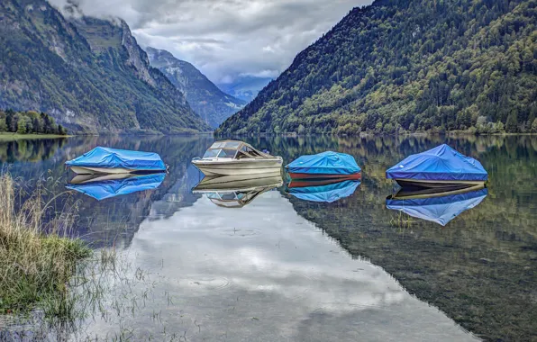 Picture forest, clouds, mountains, lake, shore, boat, tarpaulin