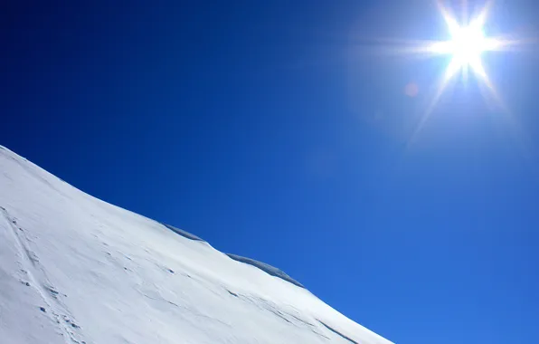 Picture the sun, snow, blue, slope