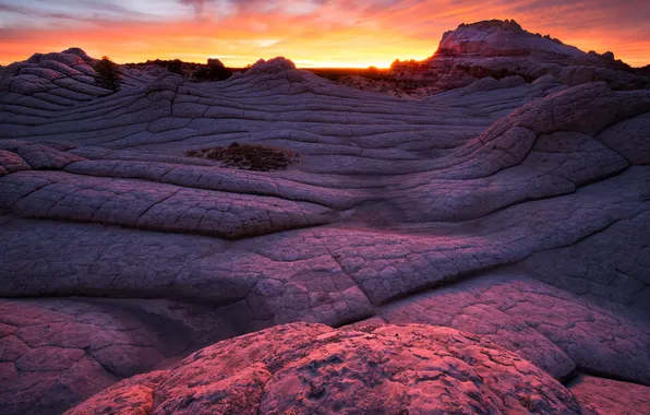 The sky, clouds, mountains, rocks, glow
