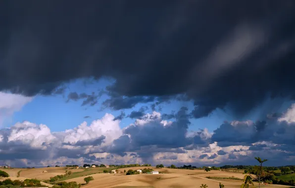 Field, clouds, home