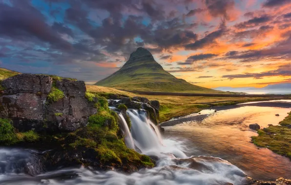 The sky, grass, clouds, sunset, mountains, stream, stones, waterfall