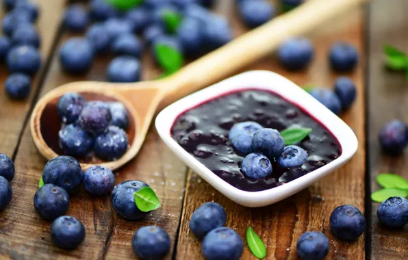 Picture blueberries, spoon, leaves, blueberry jam