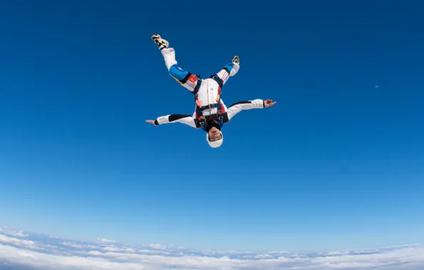 Picture the sky, clouds, the moon, parachute, container, helmet, skydivers, extreme sports