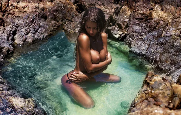 Tan, wet hair, in the water