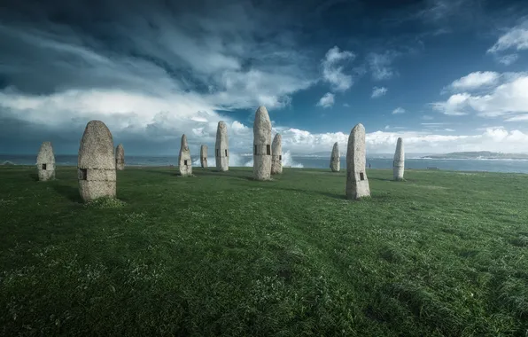 Field, the sky, clouds, stones, megaliths