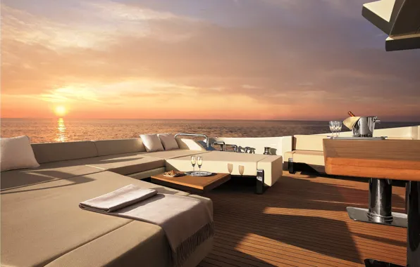 Sunset, the ocean, the evening, yacht, deck, champagne, sofas