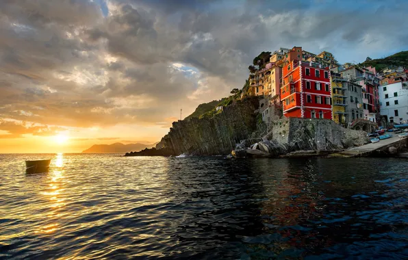 Sea, clouds, sunset, the city, rocks, shore, coast, boat