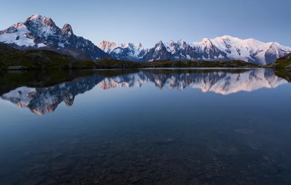 Picture the sky, the sun, nature, lake, reflection, stones, rocks, snowy mountains