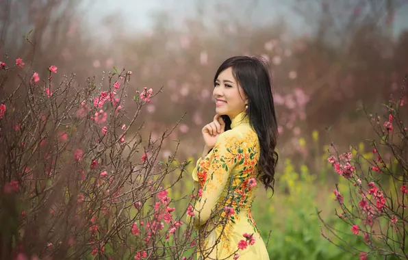 Field, girl, flowers, smile, stems, hair, yellow dress