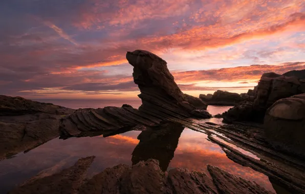 Sea, sunset, stones, rocks