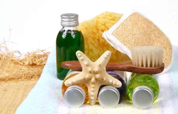 Towel, candles, soap, washcloth, shower gel, aromatic oil