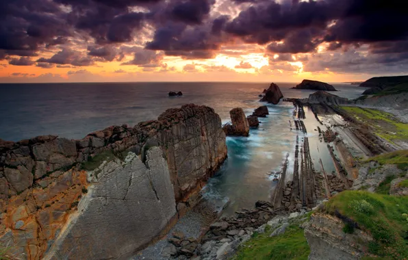 Sea, the sky, clouds, rocks