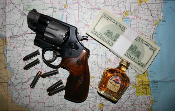 Picture money, cartridges, revolver, whiskey