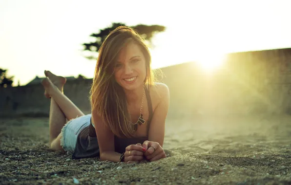 Sand, the sun, smile