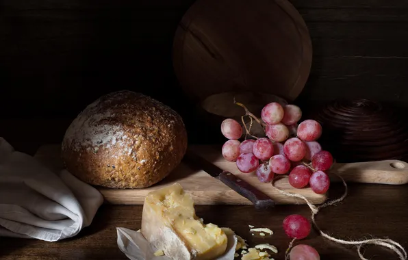 Cheese, bread, grapes, still life