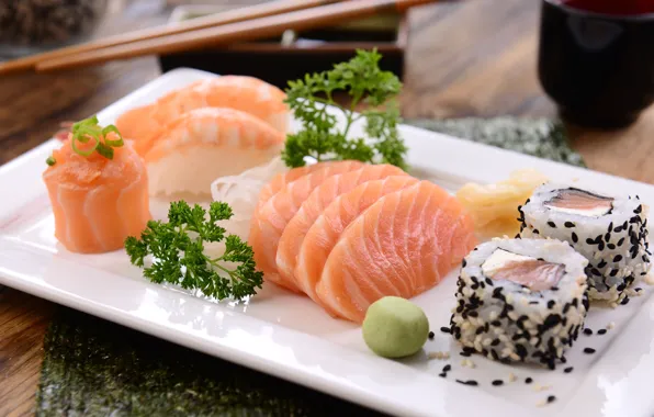 Greens, fish, slices, rolls, wasabi