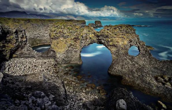 Sea, clouds, pebbles, stones, rocks, shore, hole, arch