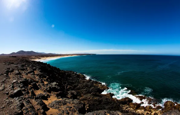 Picture the sky, the sun, the ocean, hills, coast