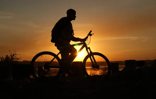 Picture the sky, sunset, guy, Bike