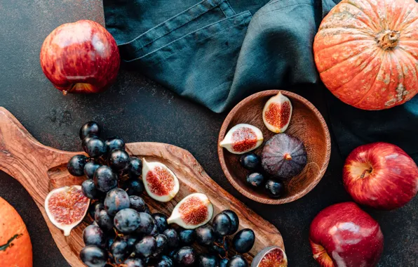 The dark background, apples, towel, grapes, fabric, pumpkin, bowl, fruit