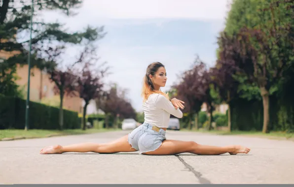 Picture girl, shorts, twine, stretching, on the road