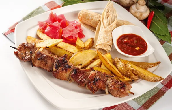 Meat, ketchup, kebab, potatoes, pita