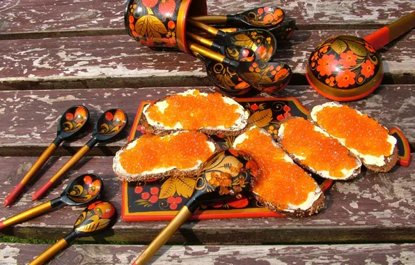 Caviar, sandwiches, caviar, wooden spoons