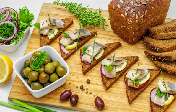 Picture bread, olives, sandwiches, herring