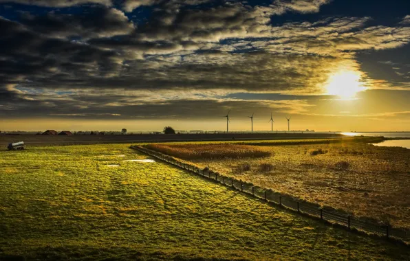Field, sunset, windmills