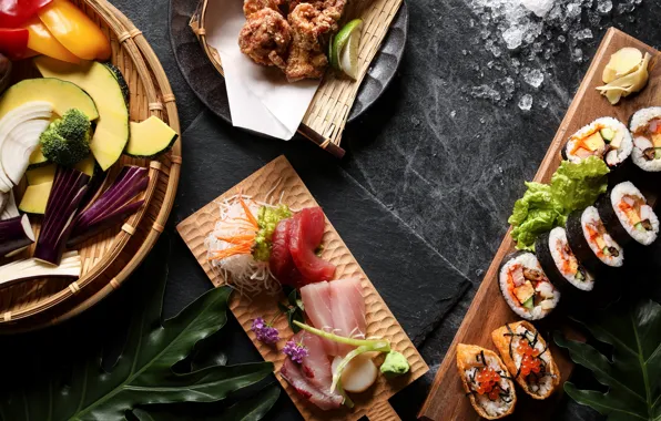 Fish, vegetables, rolls, cuts