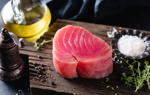 The dark background, fish, red, spices, bottle, salt, tuna, fillet