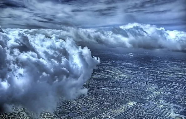 The sky, clouds, the city, the view from the top