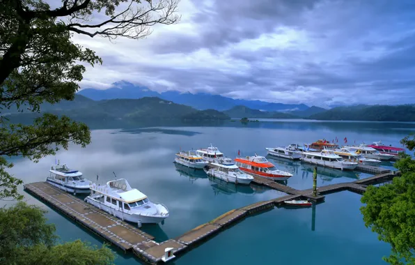 The sky, clouds, trees, mountains, lake, ships, pier, boat