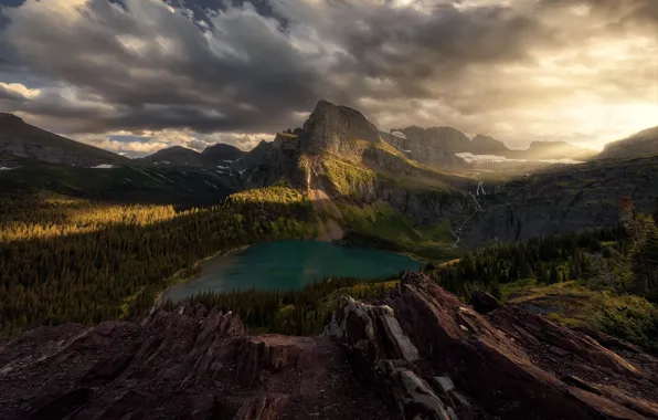 Forest, clouds, light, mountains, lake, rocks, shore, slope