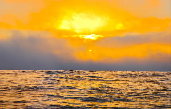 The sky, the sun, clouds, the ocean