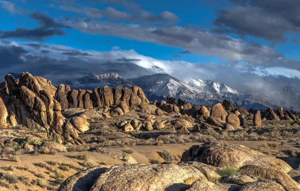 The sky, clouds, snow, mountains, clouds, stones, rocks