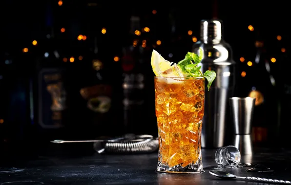 The dark background, table, wine, lemon, glass, alcohol, cocktail, bottle