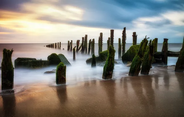 Sand, sea, the sky, clouds, shore, posts, old, pond