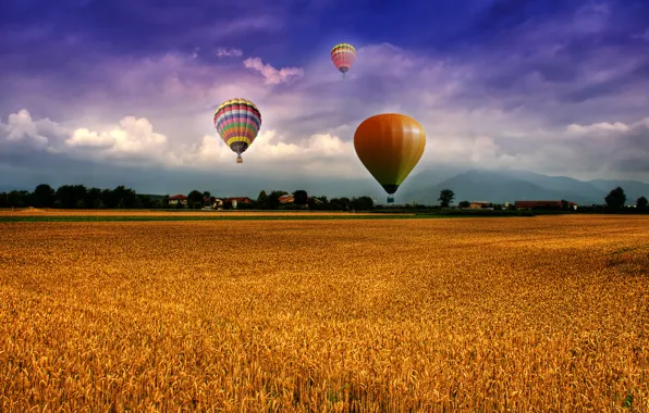 Picture the sky, clouds, mountains, balloons, Field, houses, the village