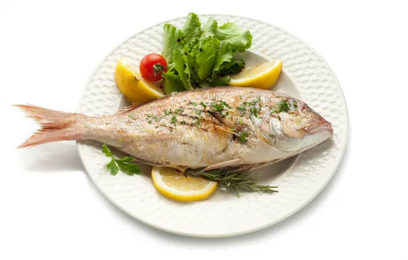 Lemon, fish, vegetables, tomato, rosemary, fried