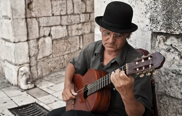 Street, people, guitar