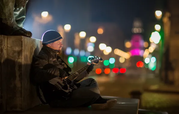 Street, people, guitar