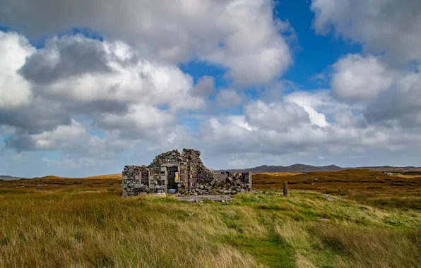 Field, clouds, ruins