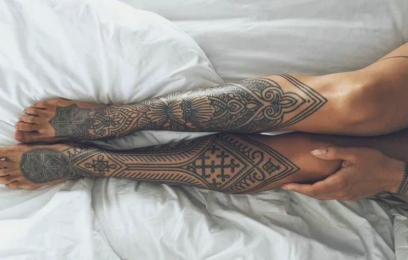 Girl, bed, manicure, toes, tattoos on the arm, tattoos on the legs