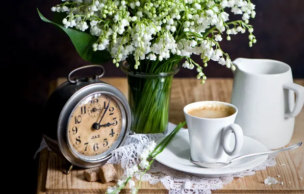 Watch, coffee, lilies of the valley, the milkman