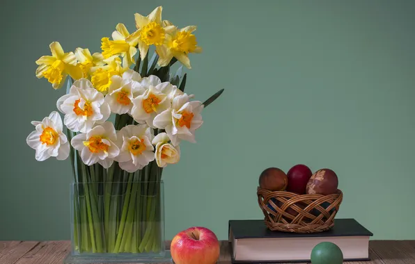 Apple, eggs, book, vase, daffodils
