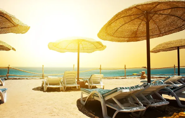 Sand, sea, beach, the sky, the sun, horizon, the fence, umbrellas