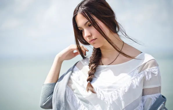 Girl, brunette, braid, light background, brooding