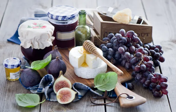 Picture cheese, grapes, jam, figs